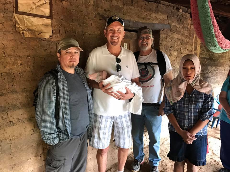 Steve McIntosh with rescue baby in Guatemala